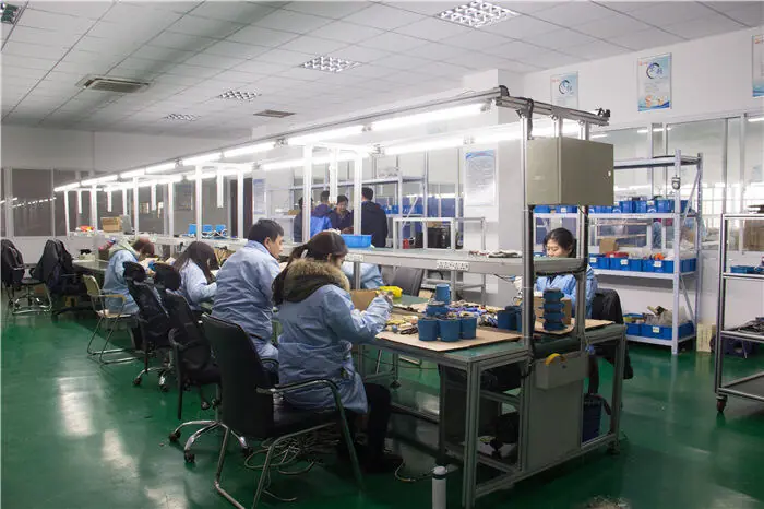KINMY production team assembling water meter testing equipment
